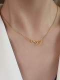Collar minimalista de corazón hueco de acero inoxidable 316L de titanio con revestimiento electrónico resistente al agua