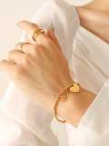 Pulsera de abalorios vintage con corazón de acero de titanio