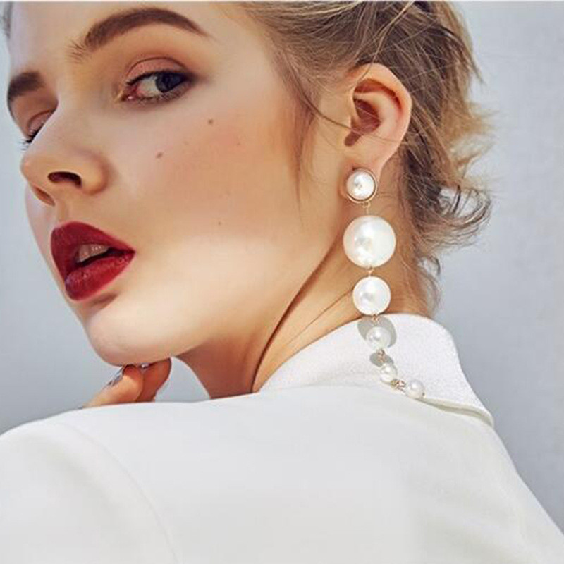 US$ 0.69 ~ US$ 0.81 - Pendientes de borla de perlas de tamaño largo de  estilo coreano para mujer al por mayor - Joyas De Acero Por Mayor