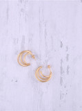 Titanio con aretes de aro geométricos huecos simplistas chapados en oro