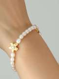 Conjunto de pulsera y collar de flores minimalistas de perlas de agua dulce de acero titanio