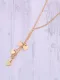 Collares de titanio con corazón simplista chapado en oro