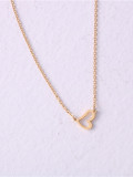 Titanio con collares de corazón liso simplista chapado en oro