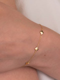 Titanio con pulseras geométricas simplistas chapadas en oro