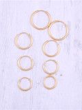 Pendientes de aro redondos simplistas de titanio con baño de oro