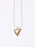 Titanio con collares de corazón liso simplista chapado en oro