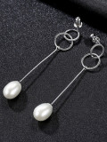 Pendientes de perla natural con diseño de anillo doble de plata pura