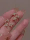 Pendiente de plata de ley 925 con circonita cúbica y estrella.