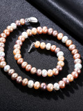 Collar de perlas de botón de plata exquisita perla de agua dulce natural de luz fuerte de 8-9 mm