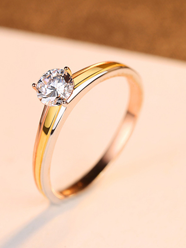 Anillo de plata de primera ley con circonitas 3A y oro bicolor