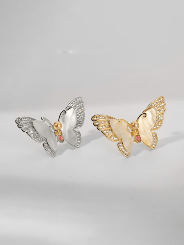 Broche de mariposa de concha de latón