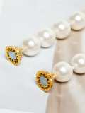 Collar minimalista redondo de perla de concha de oro laminado