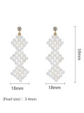 Aretes colgantes étnicos geométricos con perlas de agua dulce de oro laminado