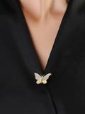 Broche de mariposa de concha de latón