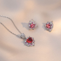 Lujoso conjunto de joyería con collar y pendientes para mujer con incrustaciones de acero y titanio en forma de corazón