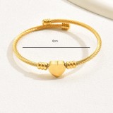 Brazalete chapado en oro de 18 quilates con revestimiento de acero inoxidable en forma de corazón de estilo moderno elegante