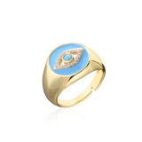 Aogu suministro transfronterizo moda europea y americana nuevo chapado en cobre anillo abierto de ojo de diablo de circón que gotea en oro de 18 quilates