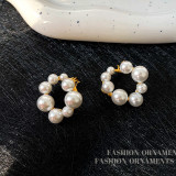 1 par de pendientes de perlas con incrustaciones de cobre redondo casual