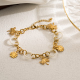Pulseras informales chapadas en oro con capas de perlas de imitación de acero inoxidable y mariposa, ojo del diablo