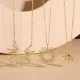 Collar con colgante chapado en oro de 14 quilates con revestimiento irregular de cobre y sol de estilo clásico elegante