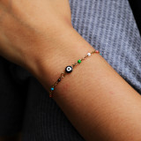 Venta al por mayor, novedad divertida, estilo Simple, ojo del diablo, pulseras con ojales esmaltados con cuentas de acero inoxidable