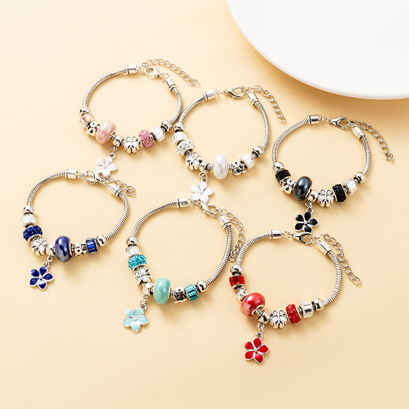 Pulseras con revestimiento de acero y titanio de cristal y flores dulces