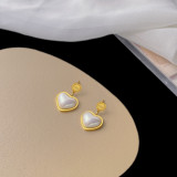 Collar de pendientes chapado en oro de 18 quilates con incrustaciones de acero de titanio y forma de corazón de estilo Simple y elegante