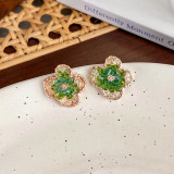 1 par de pendientes de diamantes de imitación con incrustaciones de cobre y mariposas y flores en forma de corazón dulce de estilo Vintage