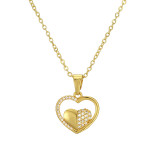 Collar con colgante chapado en oro con incrustaciones de cobre y circonita con forma de corazón y letras de streetwear