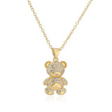 Collar dorado con colgante de oso de circonita con microincrustaciones de cobre europeo y americano