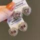 1 par de pendientes elegantes con forma de corazón dulce con incrustaciones de cobre y circonita