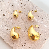 1 par de aretes de cobre chapados en ondas de estilo simple