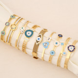 Brazalete esmaltado de acero inoxidable con ojo de viaje retro