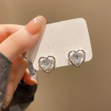 Pendientes de diamantes de imitación con incrustaciones de cobre con nudo de lazo en forma de corazón dulce 1 par