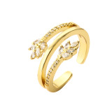 Lujoso anillo abierto de circonita con incrustaciones de cobre geométrico