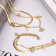 Collar de pulseras de piedras preciosas artificiales con incrustaciones de acero de titanio con ojo de moda