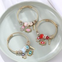 Brazalete de acero inoxidable con forma de corazón y ojo de diablo, bonito y dulce