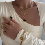 Collar de oro de acero inoxidable con colgante en forma de corazón de melocotón retro simple
