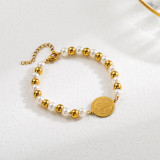 Pulseras chapadas en oro con perlas de imitación de acero inoxidable con forma de corazón de palma y ojo de diablo de estilo moderno al por mayor