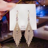 Pendientes colgantes de circonita con incrustaciones de cobre y nudo de lazo en forma de corazón a la moda, 1 par