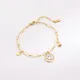 Pulseras de retales de acero de titanio y acero inoxidable con mariposa y cara sonriente geométrica de estilo simple