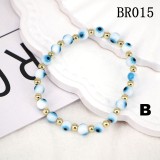 Pulsera con cuentas de ojos de vidrio coloreado estilo étnico