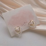 Pendientes de diamantes de imitación con incrustaciones de cobre con nudo de lazo en forma de corazón dulce 1 par