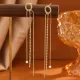 1 par de pendientes colgantes de circonita con perlas de agua dulce de cobre con incrustaciones de borlas