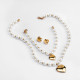 Elegante forma de corazón de acero inoxidable con cuentas de perlas artificiales, pulseras, pendientes, collar