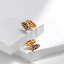 1 par de aretes de diamantes de imitación de cobre con incrustaciones de ojos de estilo simple