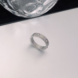 Anillos de diamante artificiales con incrustaciones de pulido de acero de titanio redondos de moda 1 pieza