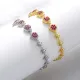 Pulseras chapadas en oro de 18K con incrustaciones de cobre y flor de trébol de cuatro hojas lujosas elegantes