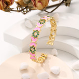 Brazalete chapado en oro de 14 quilates con incrustaciones de latón y mariposa Commute
