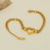 Pulseras chapadas en oro de titanio con revestimiento de acero en forma de corazón con ondas de estilo simple